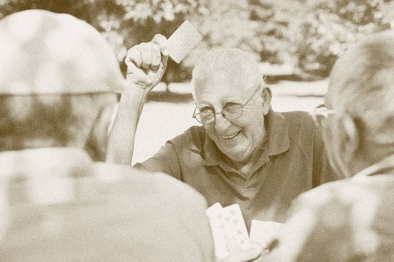 Residents at Alhambra playing card games