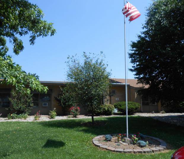An exterior shot of the Alhambra Rehab and Healthcare facility, from the Alhambra Gallery