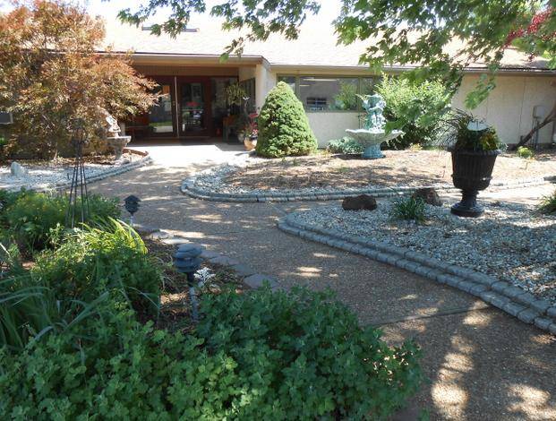 An exterior shot of the Alhambra Rehab and Healthcare facility, from the Alhambra Gallery